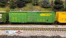 Load image into Gallery viewer, A photographer captured a Washington Northern boxcar on Mark Herrick's HO -Scale BNSF Montana Division model railroad!